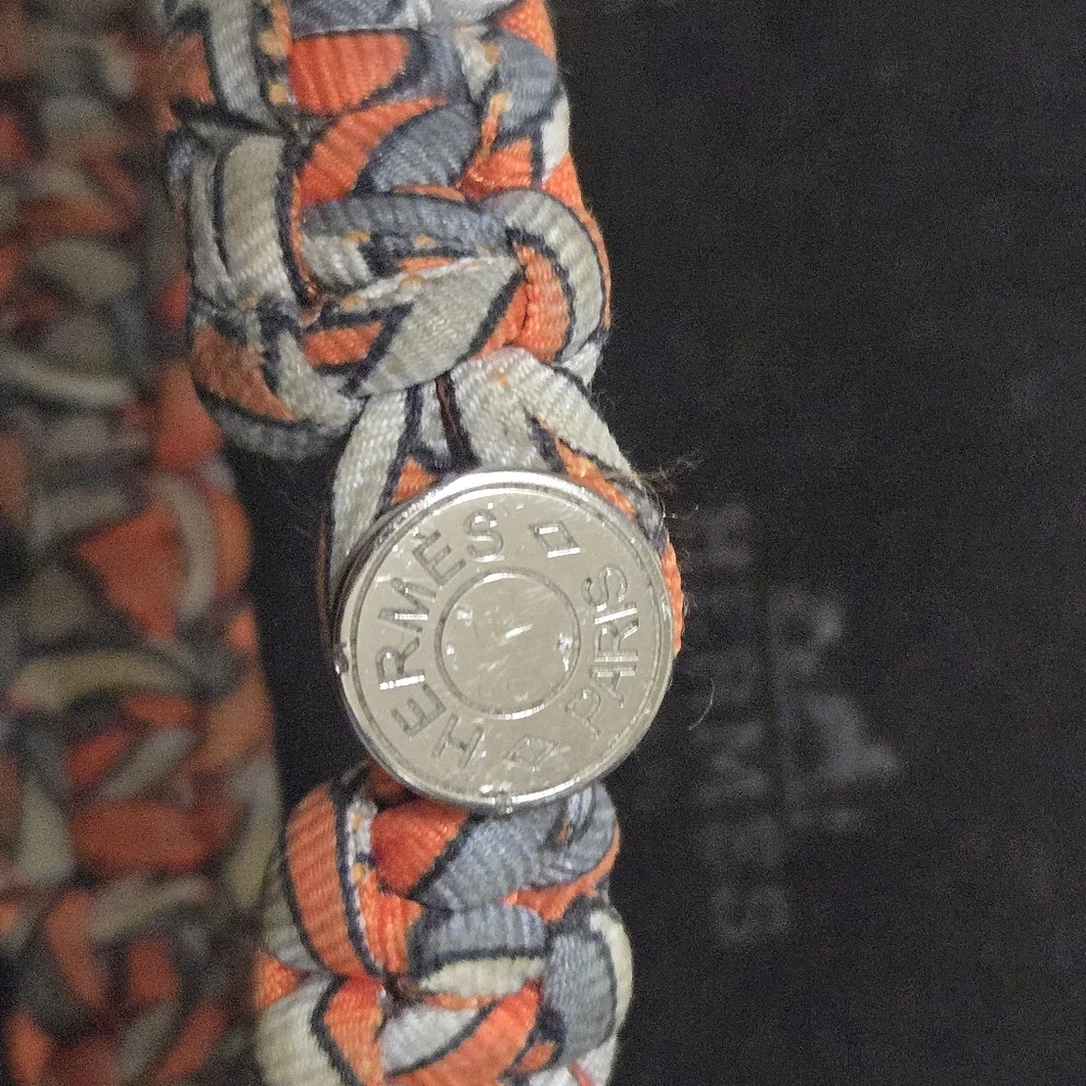 Authentic HERMES Silk Twill Kid Bracelet in Orange.